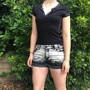 Black and white cuffed UO denim shorts